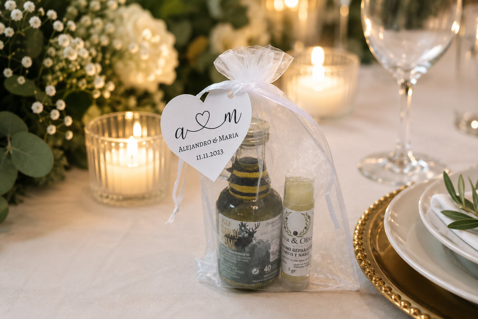 Botellita de AOVE y bálsamo personalizados en bolsa de organza